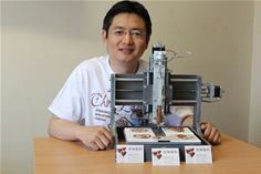 Beam me up choccy      Dr Liang Hao, lead scientist from the University of Exeter project that created the 3D chocolate printing machine being demoed at NextGen, Bristol.