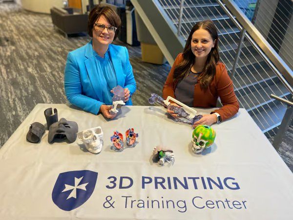 Clarkson College’s Assistant Director of Radiography/Medical Imaging and Advanced Technology Patricia (Trish) Weber (left) and 3D Printing and Training Center Administrator Blair Kauzlaric...