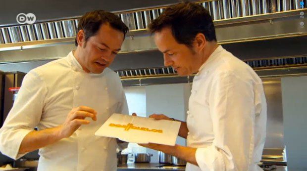 Brothers Javier and Sergio Torres with their edible 3D Printed logo - DW