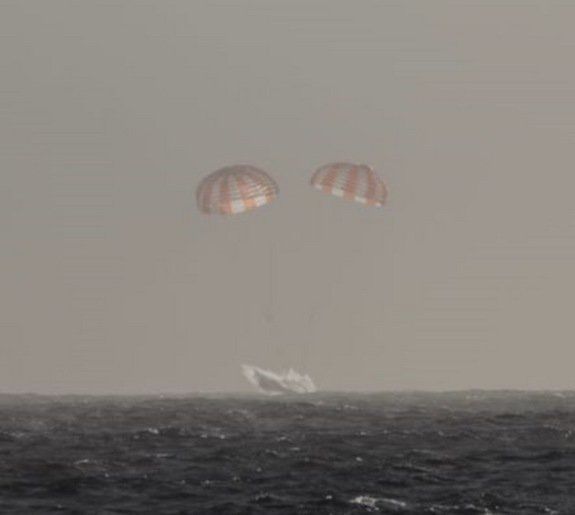 Dragon Capsule's Splash Down                Splashing Down in the Pacific.