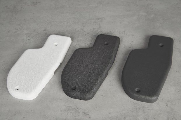 Daimler DyeMansion spare parts      Left: an SLS raw part; Centre: an SLS spare part finished with DyeMansion technology in Daimler EvoGrey; and Right: an injection moulded spare part.