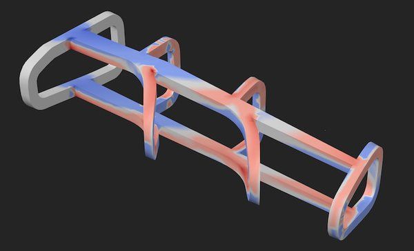 Heat map showing stress and strain distribution across the geometry under the applied load. - Continuous Composites