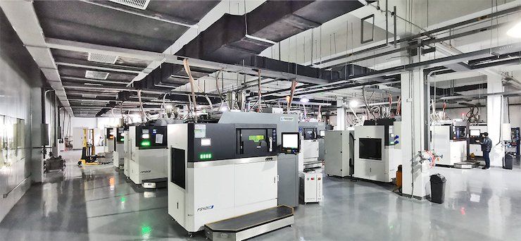 An array of 18+ Farsoon’s FS421M metal systems are installed at Falcontech Super AM Factory. - Falcontech