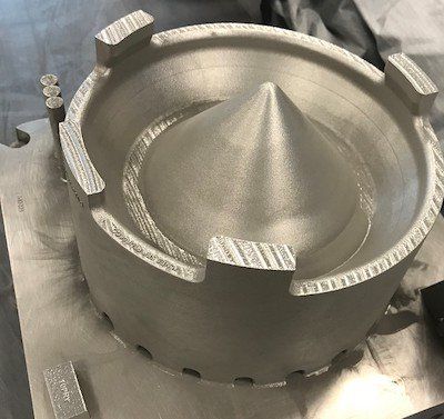 Additively manufactured sump cover for the F110 engine. - GE Additive