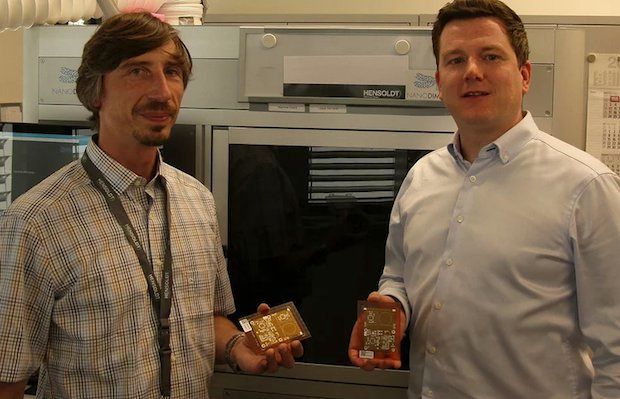 HENSOLDT ALM project manager Andreas Salomon (left) and Nano Dimension's Director Sales EMEA Valentin Storz with the first PCB samples additively manufactured on the DragonFly LDM.