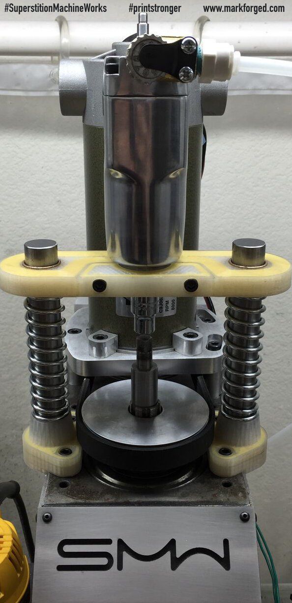 Markforged SMW                A Mark One customer using reinforced parts as part of a tool change assembly. Source: #superstitionmachineworks