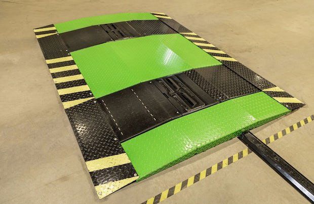Nokian SnapSkan 2      As the vehicle goes over the speed-bump-like scanner, lasers will automatically put its focus into the tyre treads, measuring their depth. - Nokian