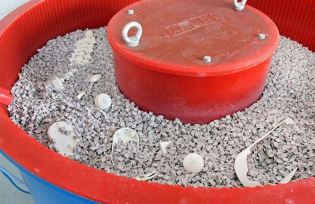 Plastic 3D printed components after processing.