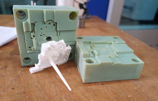 3D printed injection mould      3D printed injection mould with resulting part, produced on a Stratasys Objet Connex 3D printer.