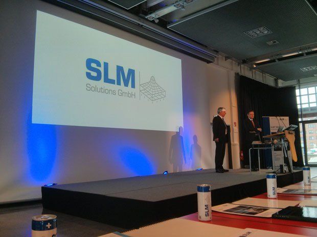 SLM Solutions User Group      Stefan Ritt and Dr Markus Rechlin on stage introducing the gathered crowd to the SLM Solutions User Group Meeting.
