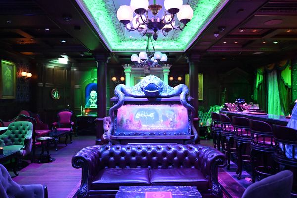 The Haunted Mansion Parlor lounge aboard a Disney ship