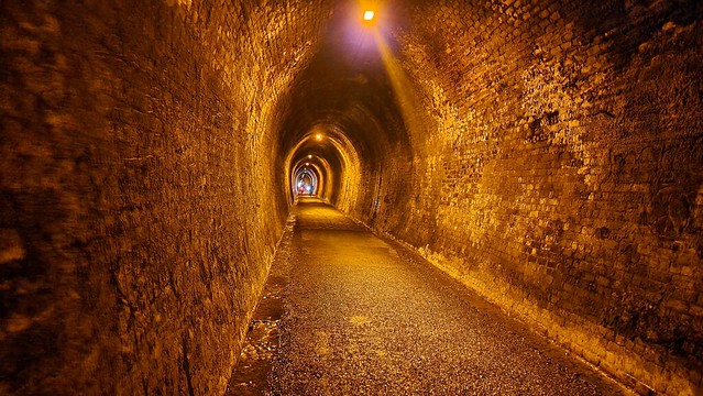 Midway in the 1100-metre long former railway tunnel