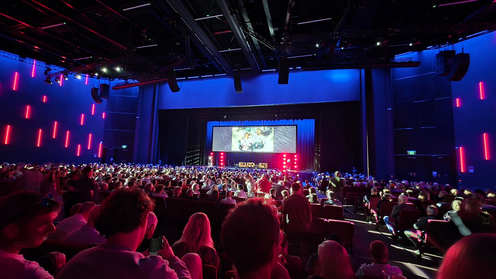 Dark'ish theatre space with spot lighting, taken before the show started.