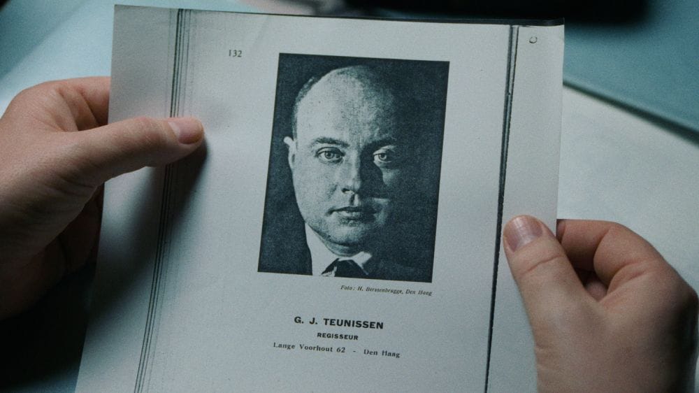 A photograph of Jan Teunissen on the cover of a photocopied report.
