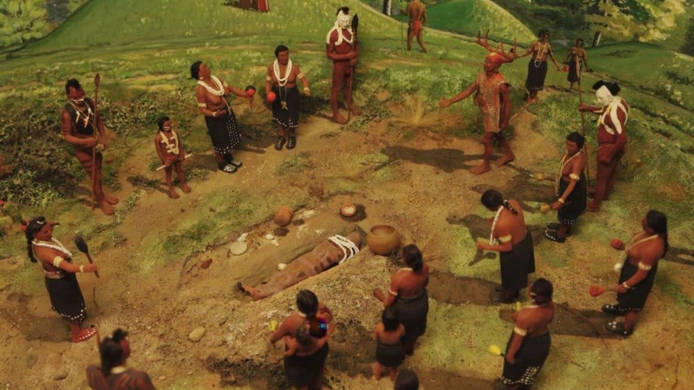 A diorama of an indigenous burial.
