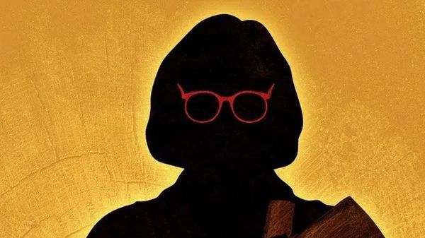 a graphic illustrated image of a woman in silhouette with red glasses and holding a wooden log on a golden yellow background.