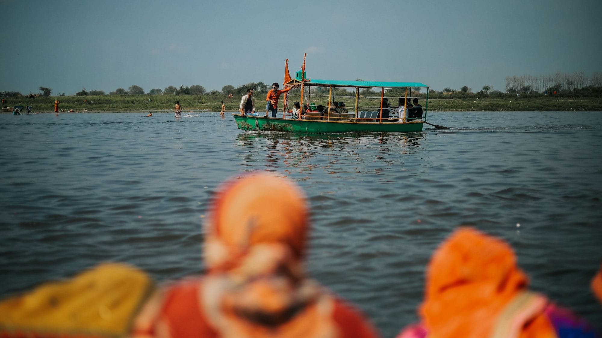 people in boat on water during daytime