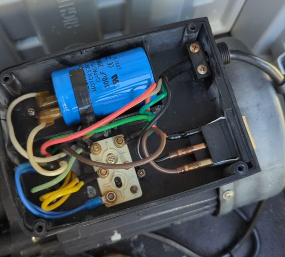 Inside the pump terminal box before modification