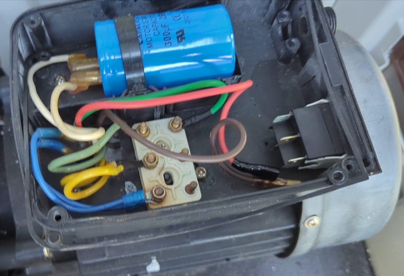 Inside the pump terminal box during conversion
