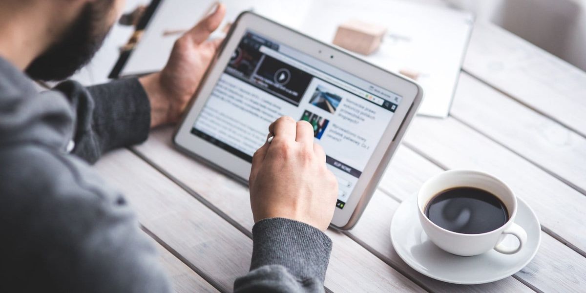 Man Reading an AI Blog