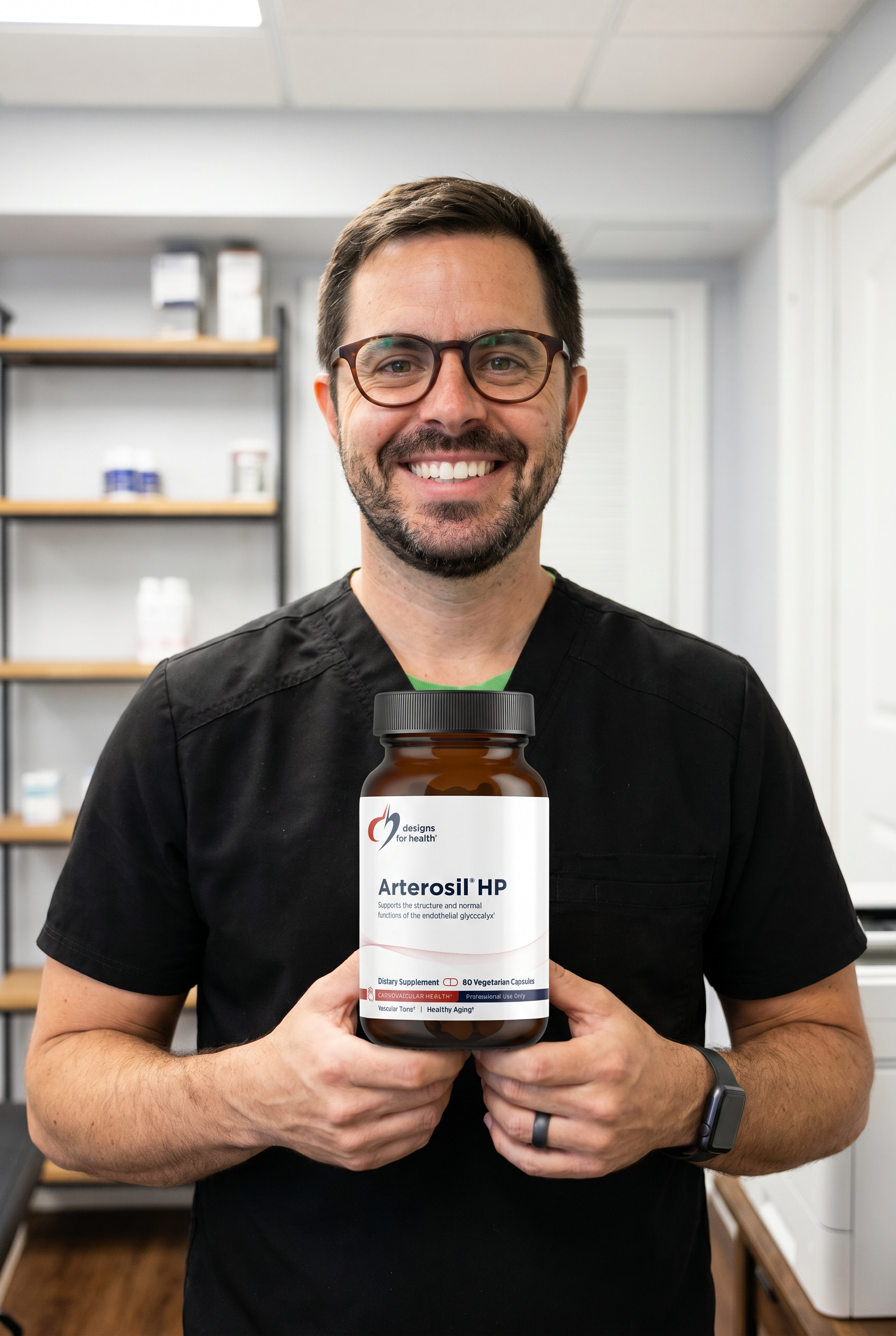 Dr. Bell holding Arterosil HP