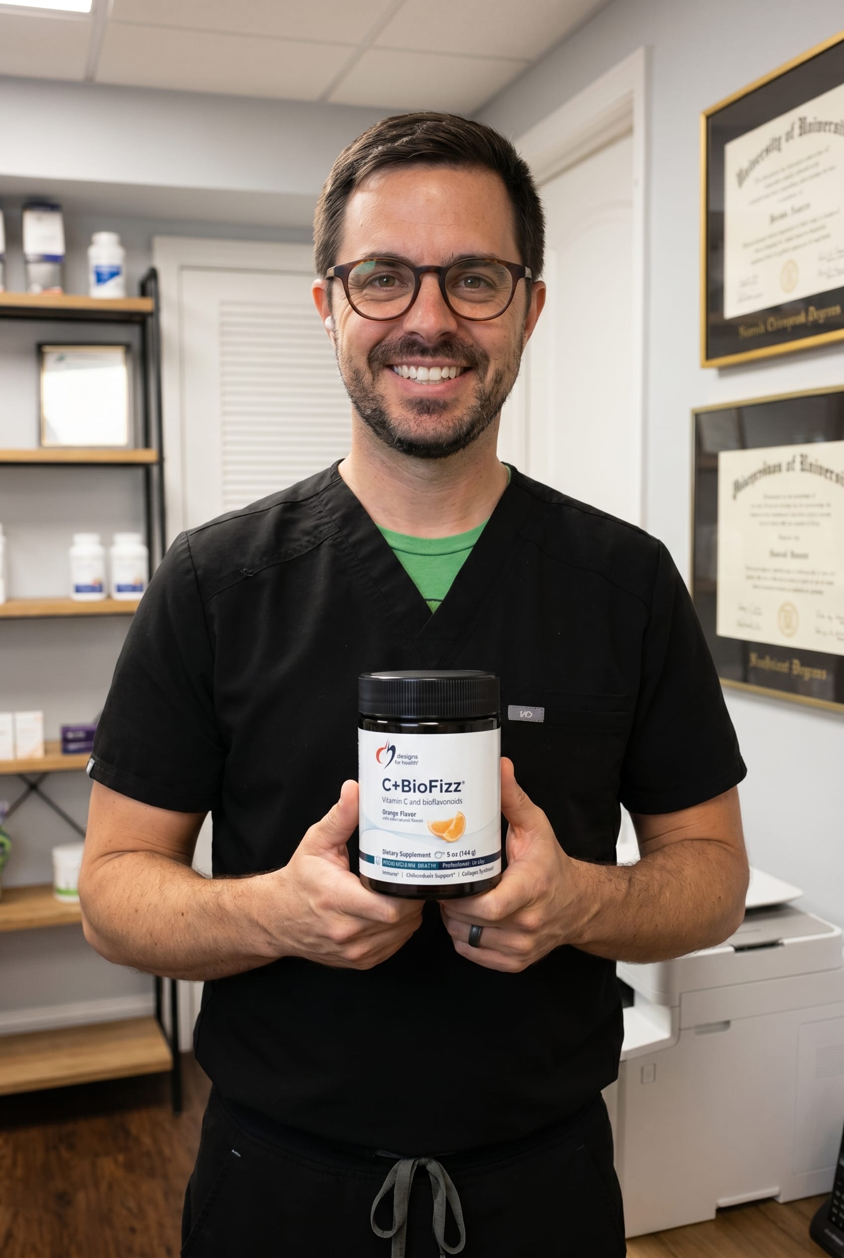 Dr. Bell holding cbio-fizz