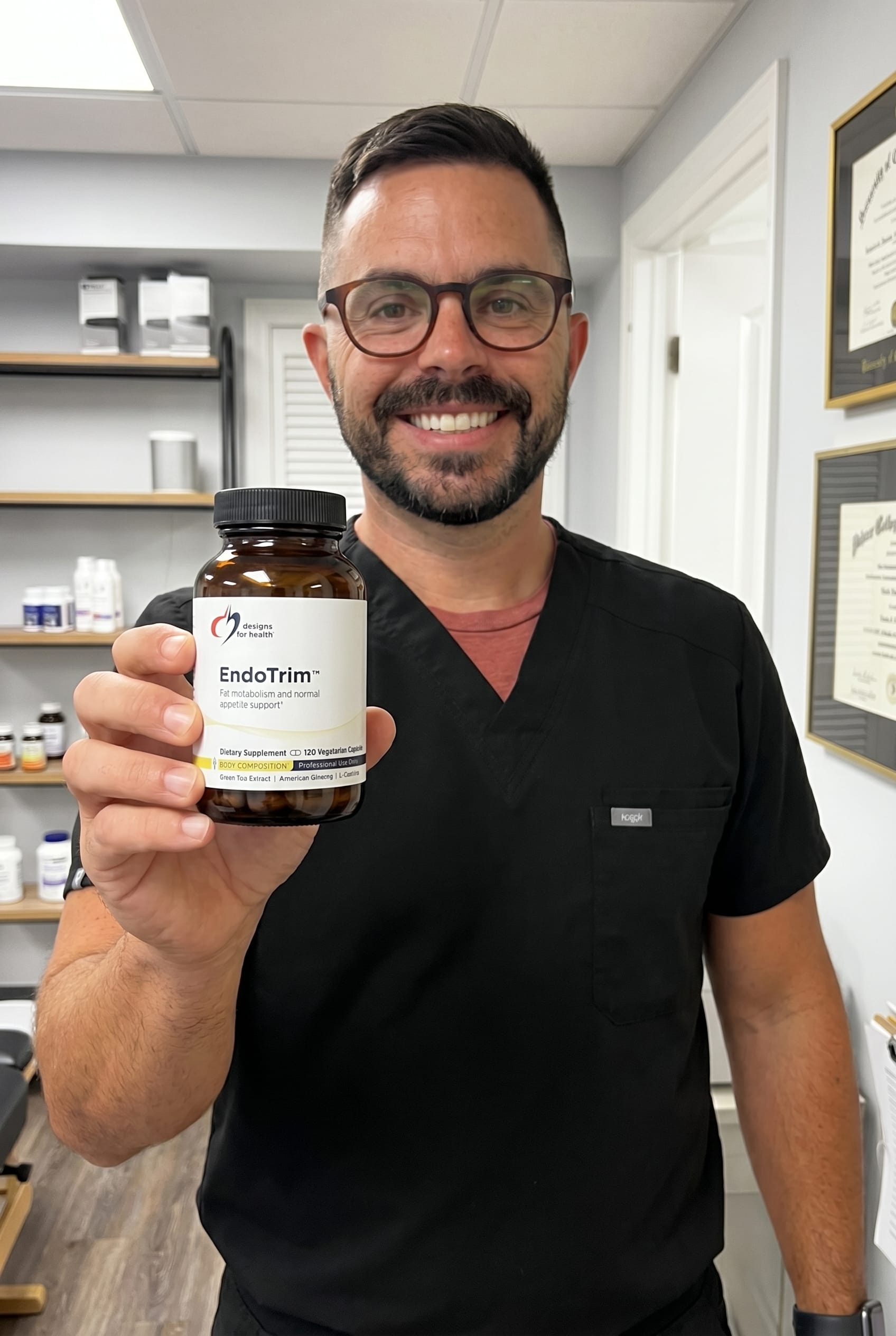 Dr. Bell holding EndoTrim