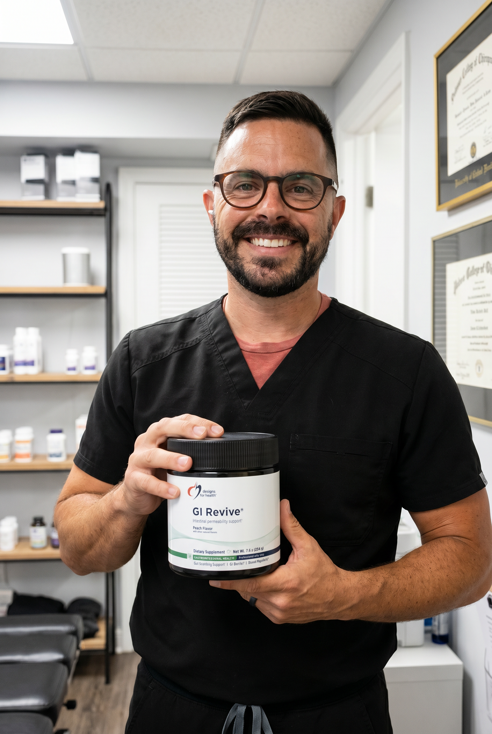 Dr. Bell holding gi-revive-powder