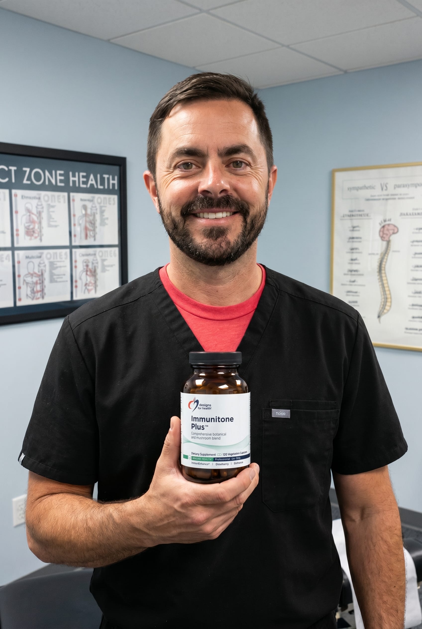 Dr. Bell holding Immunitone Plus