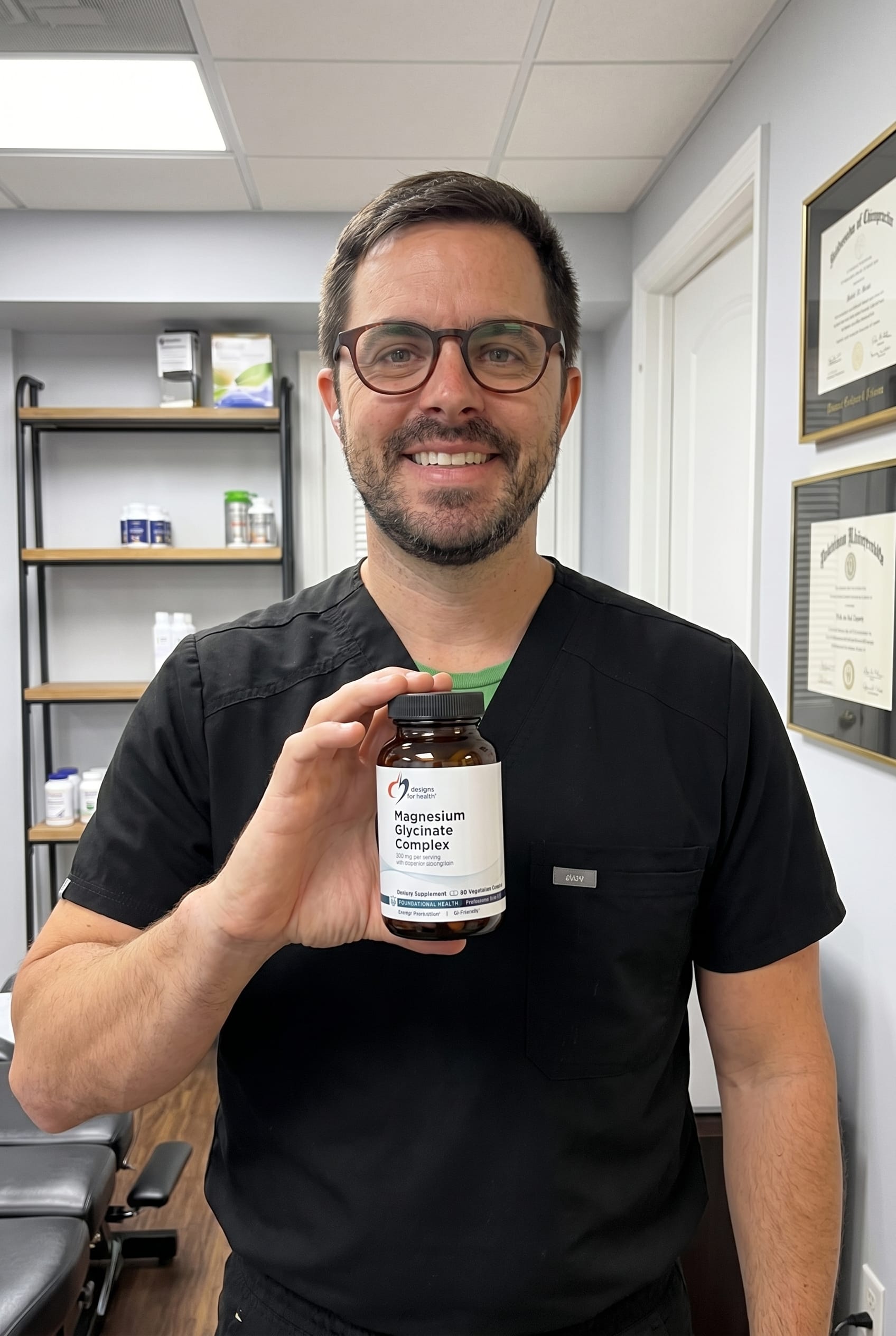 Dr. Bell holding Magnesium Glycinate Complex