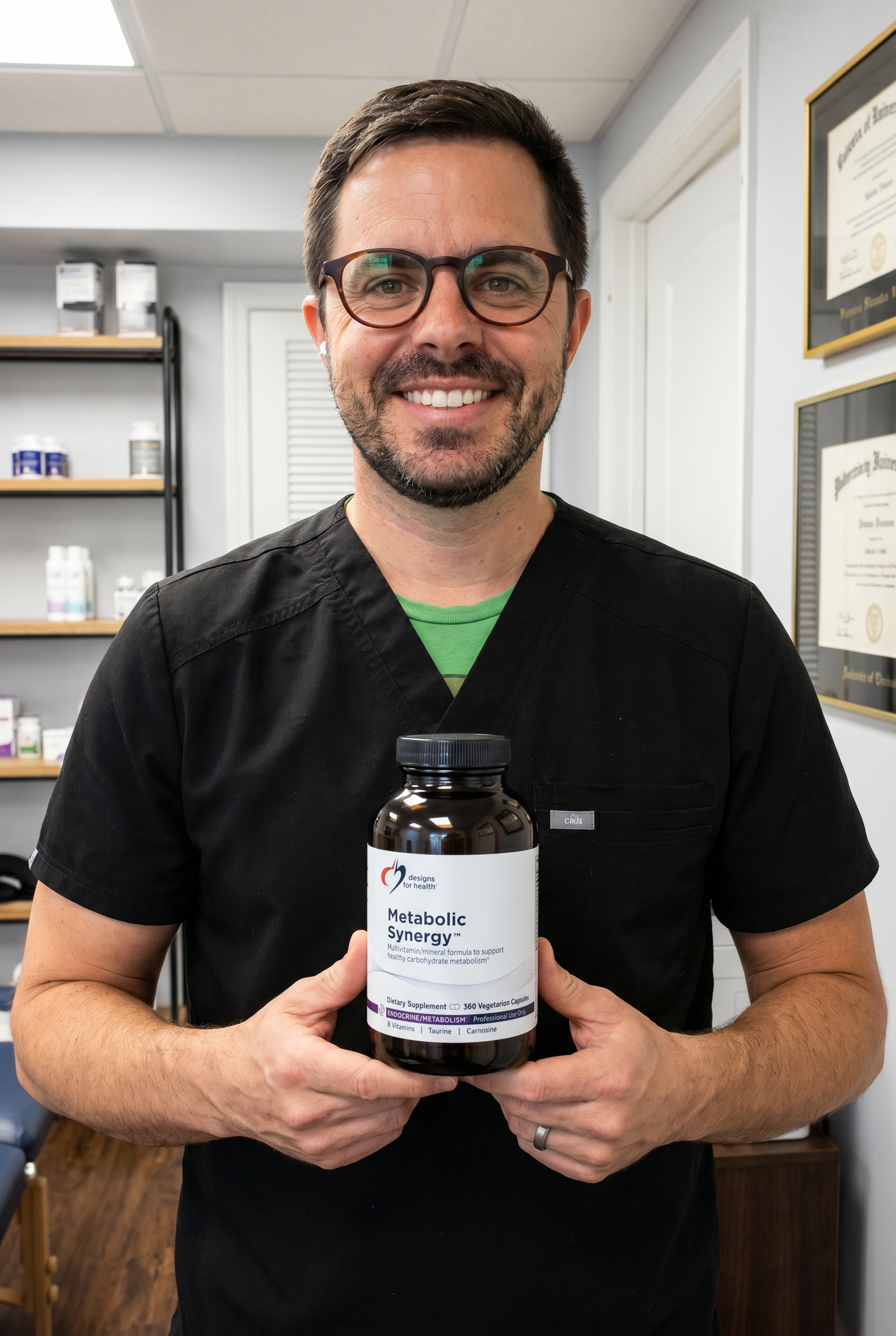 Dr. Bell holding Metabolic Synergy