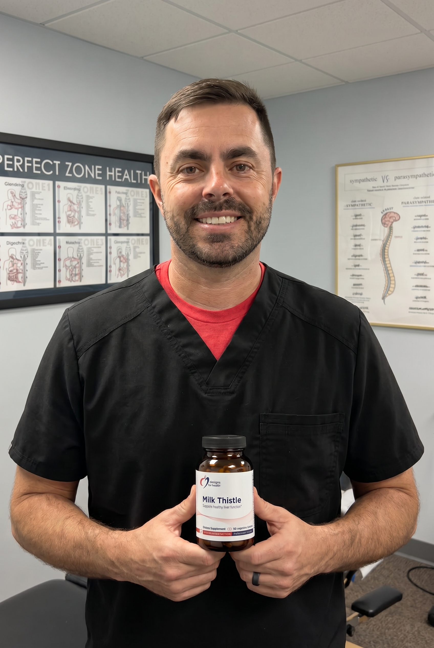Dr. Bell holding milk-thistle