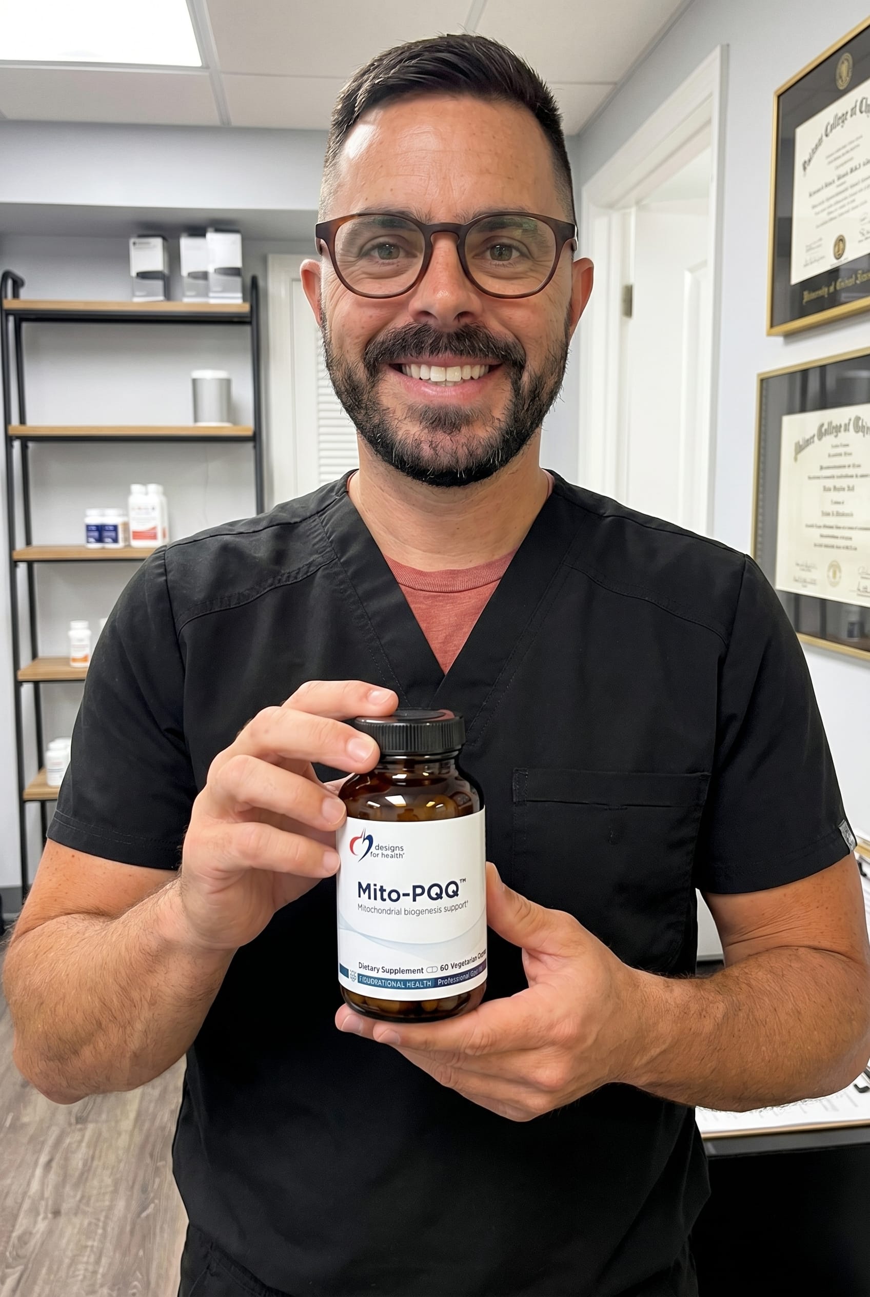 Dr. Bell holding Mito-PQQ