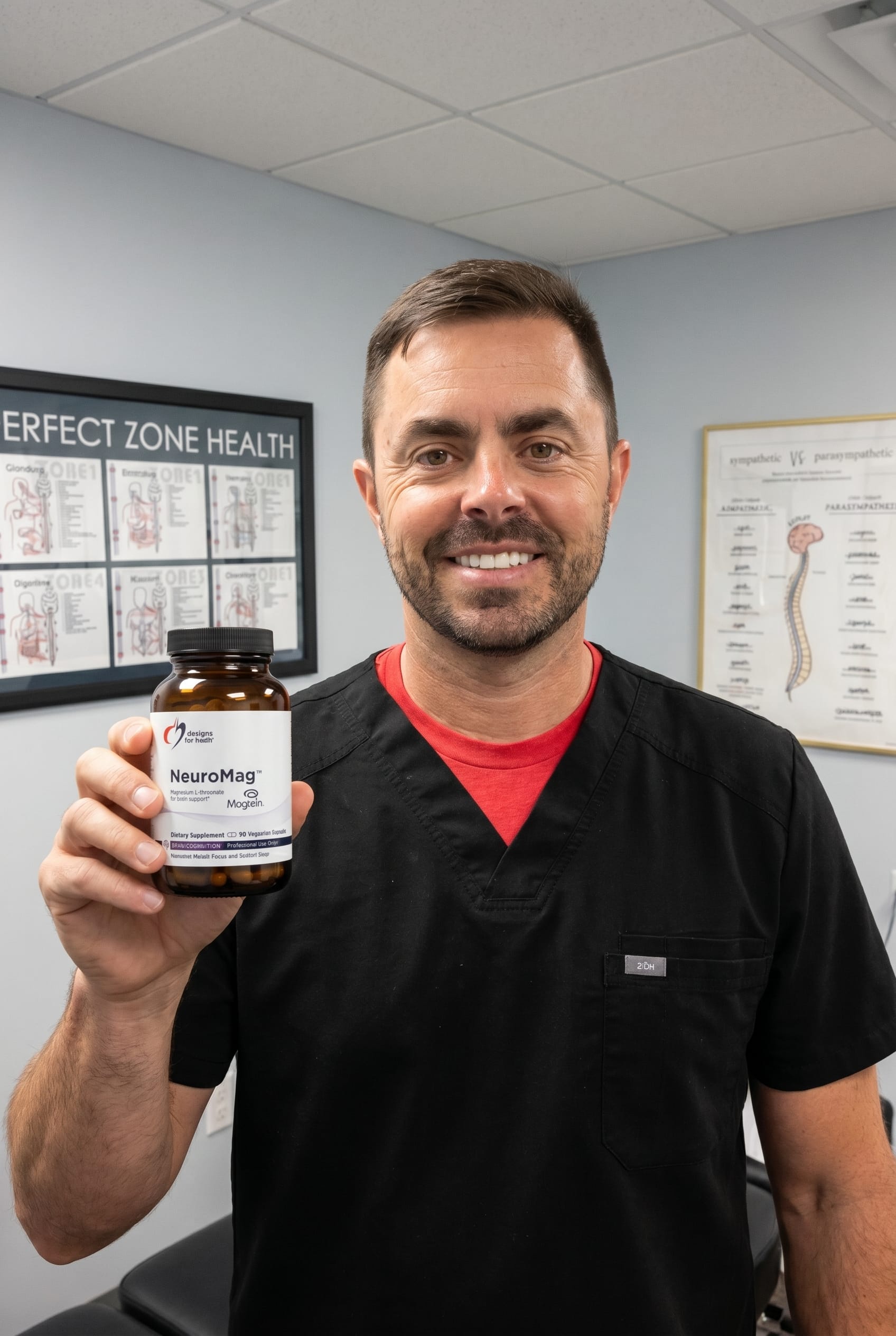 Dr. Bell holding NeuroMag