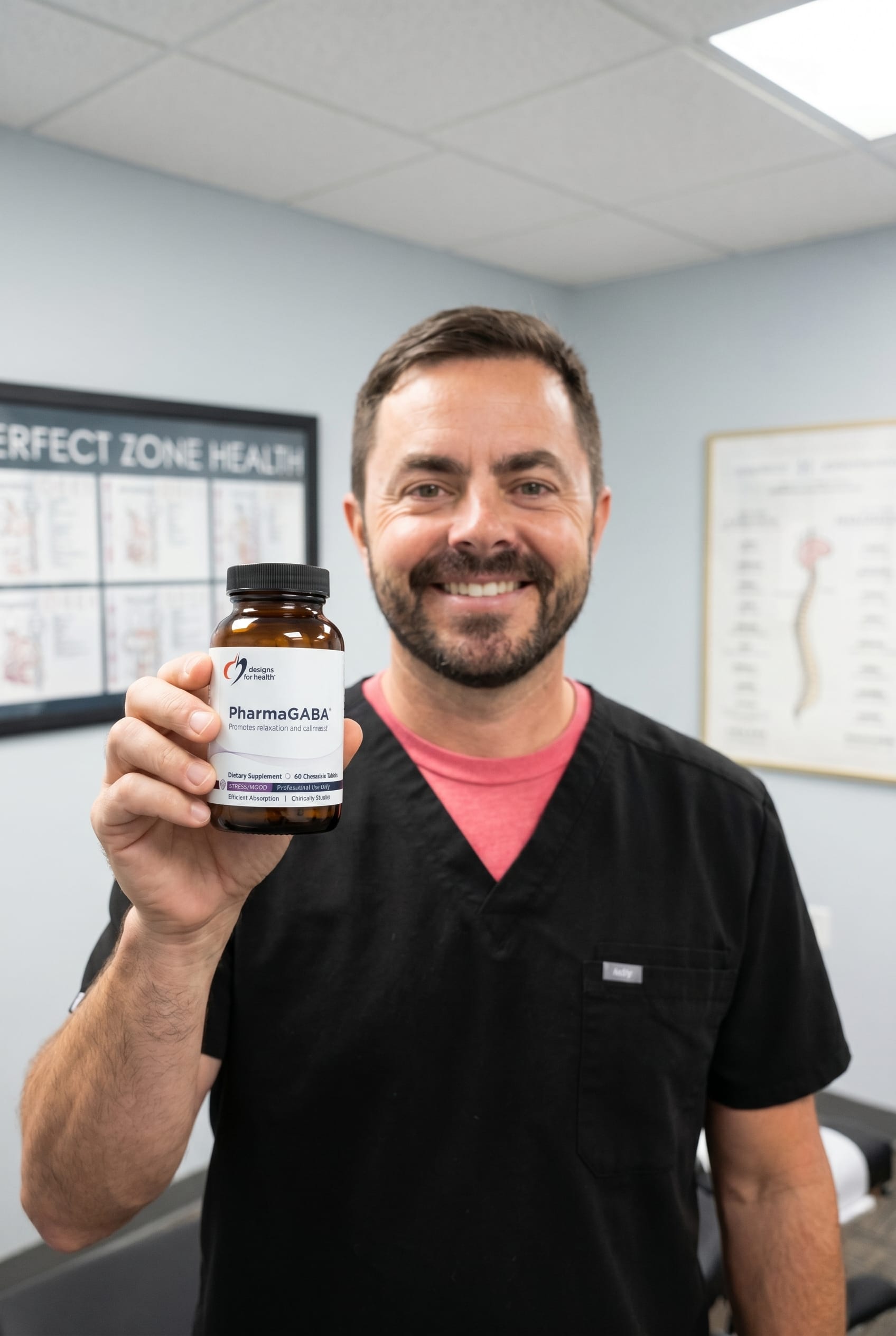 Dr. Bell holding PharmaGABA