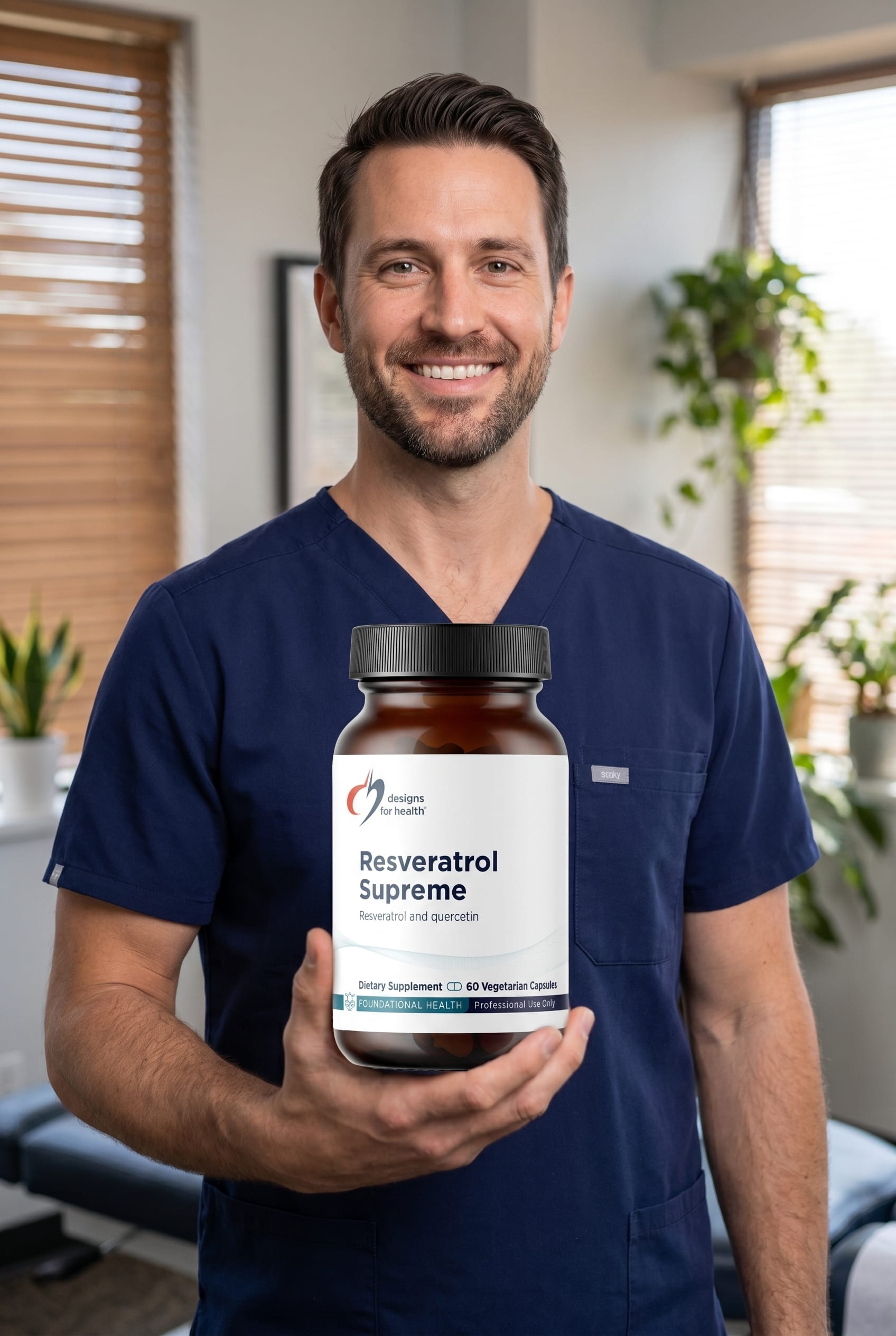 Dr. Bell holding Resveratrol Supreme