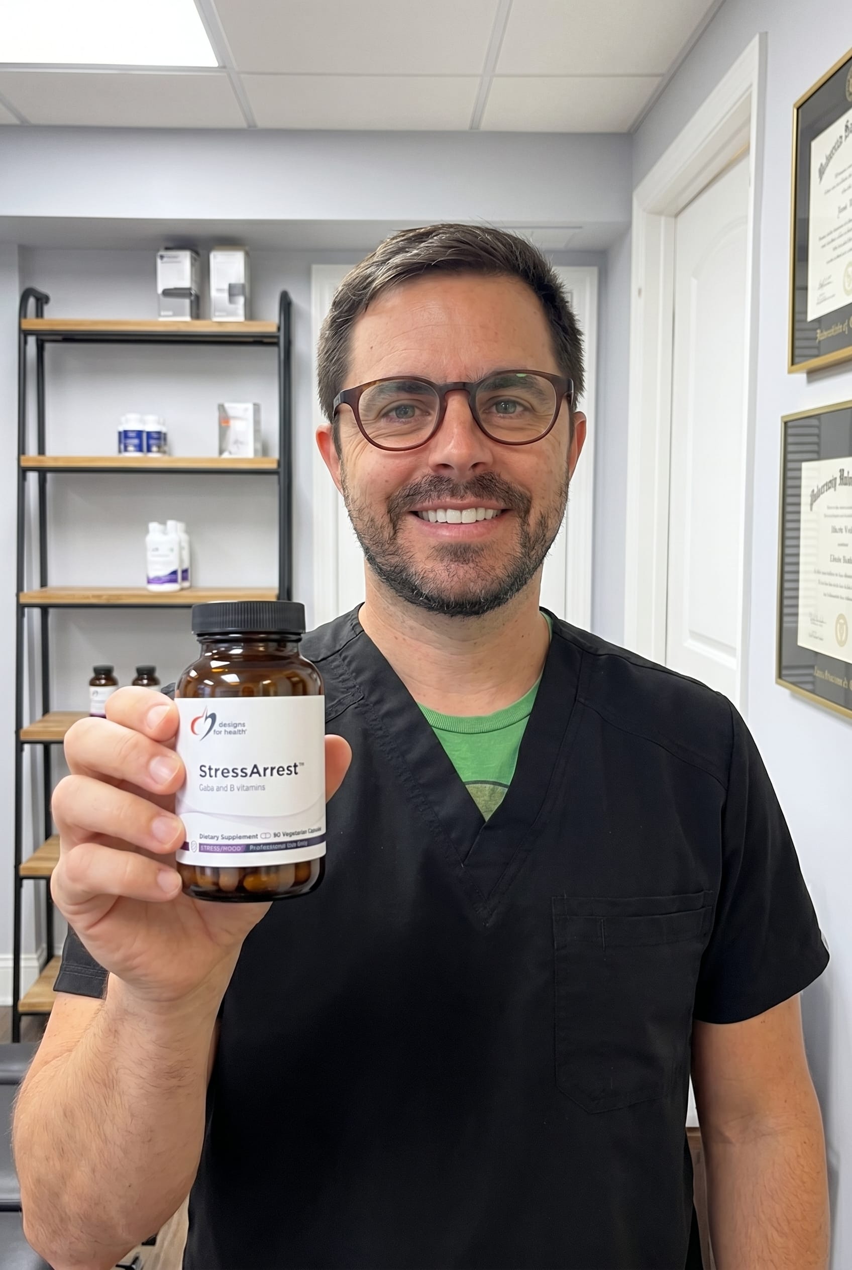 Dr. Bell holding StressArrest