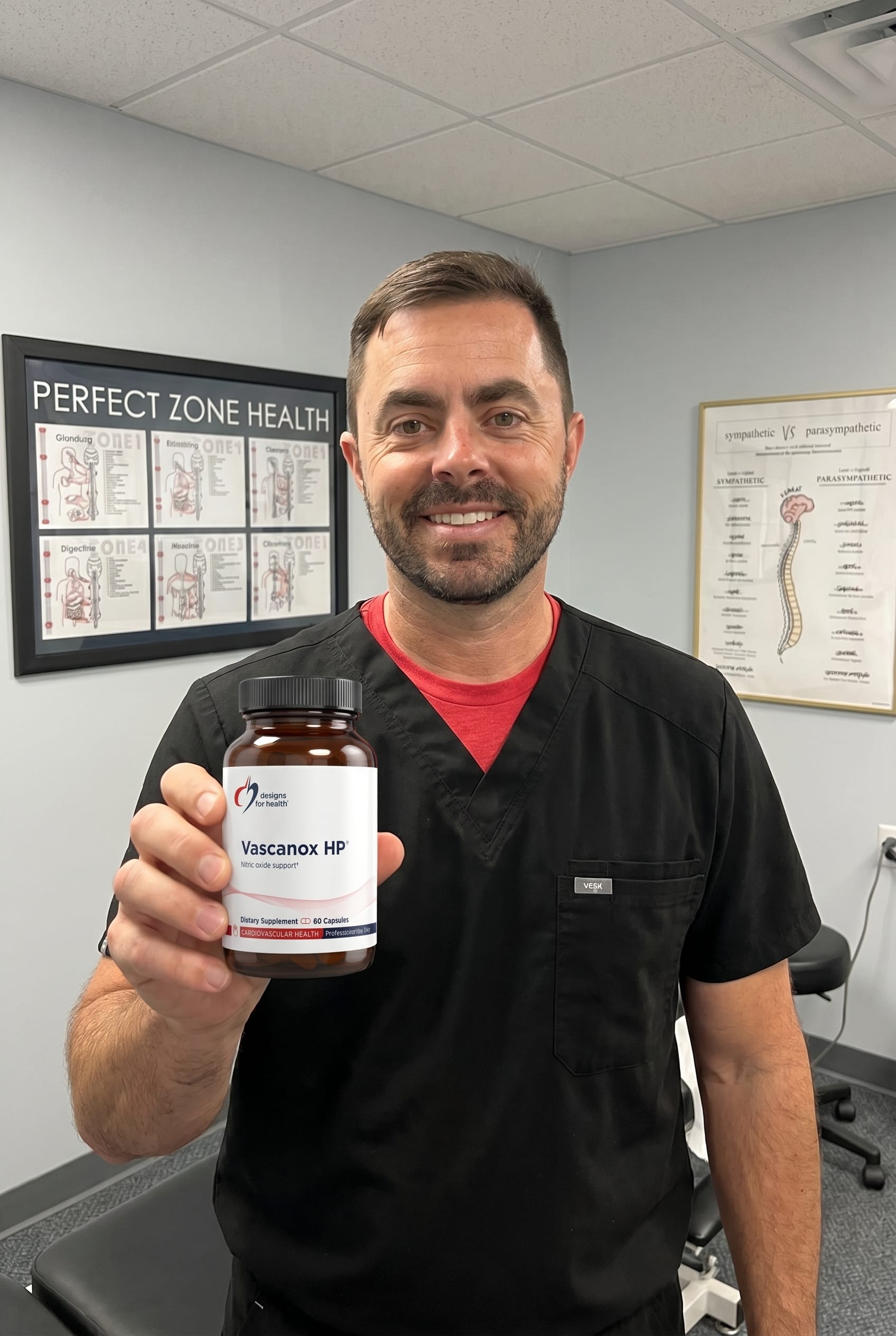 Dr. Bell holding Vascanox HP