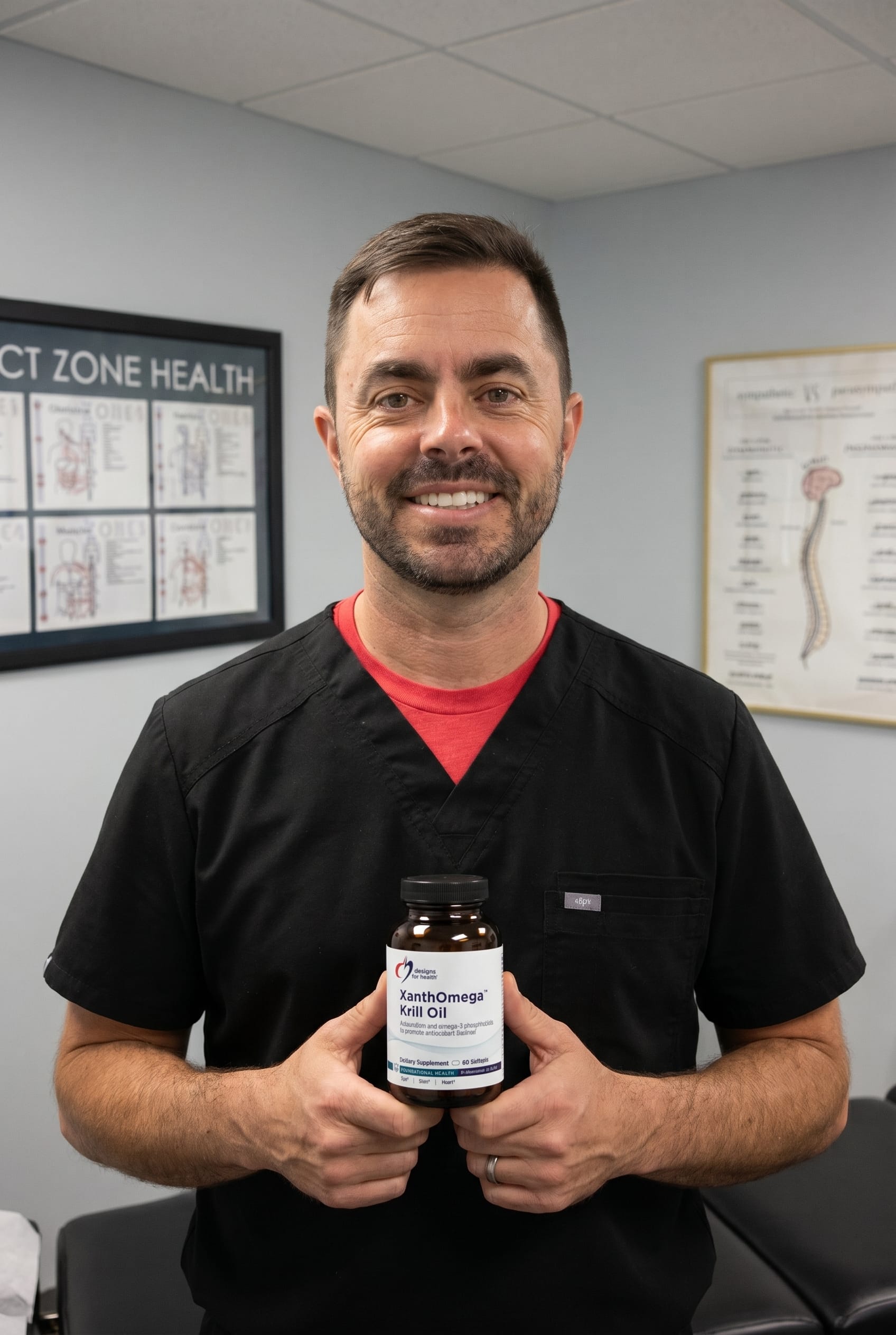 Dr. Bell holding XanthOmega Krill Oil