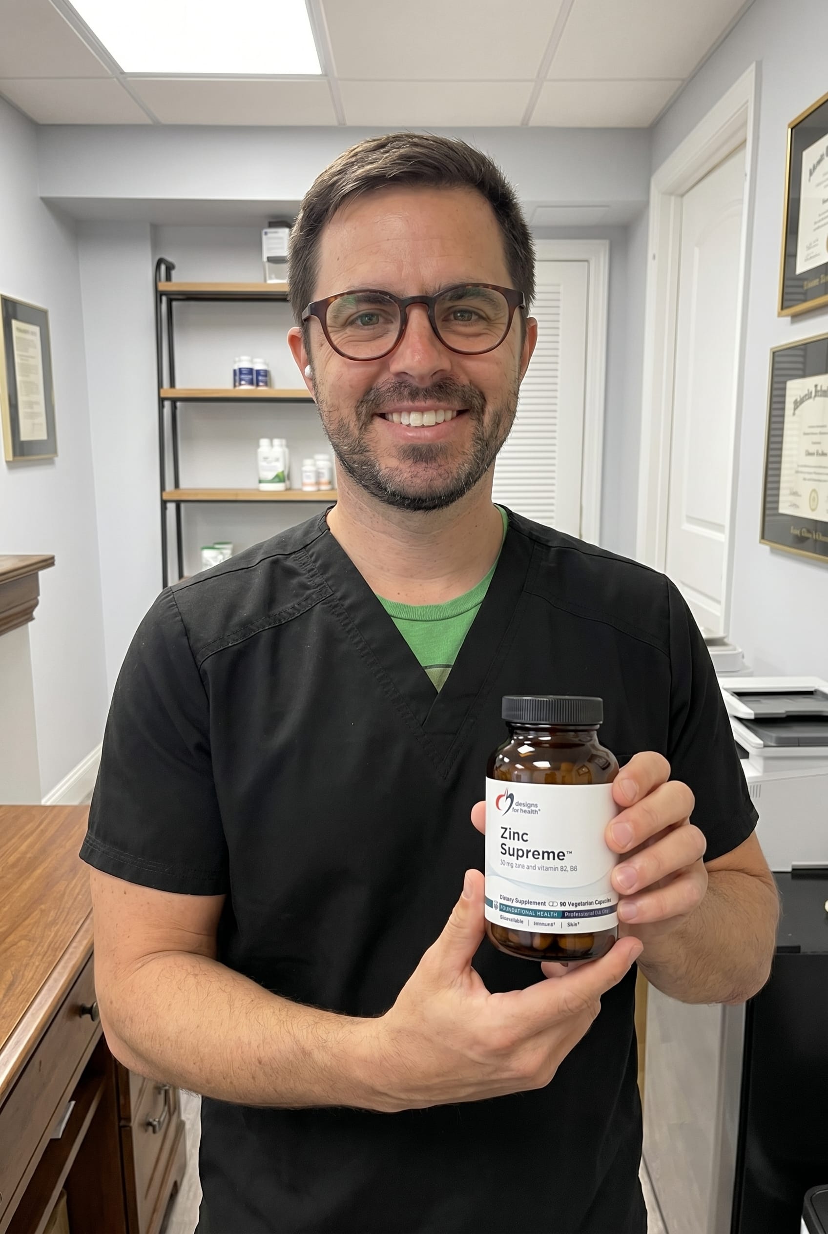 Dr. Bell holding Zinc Supreme