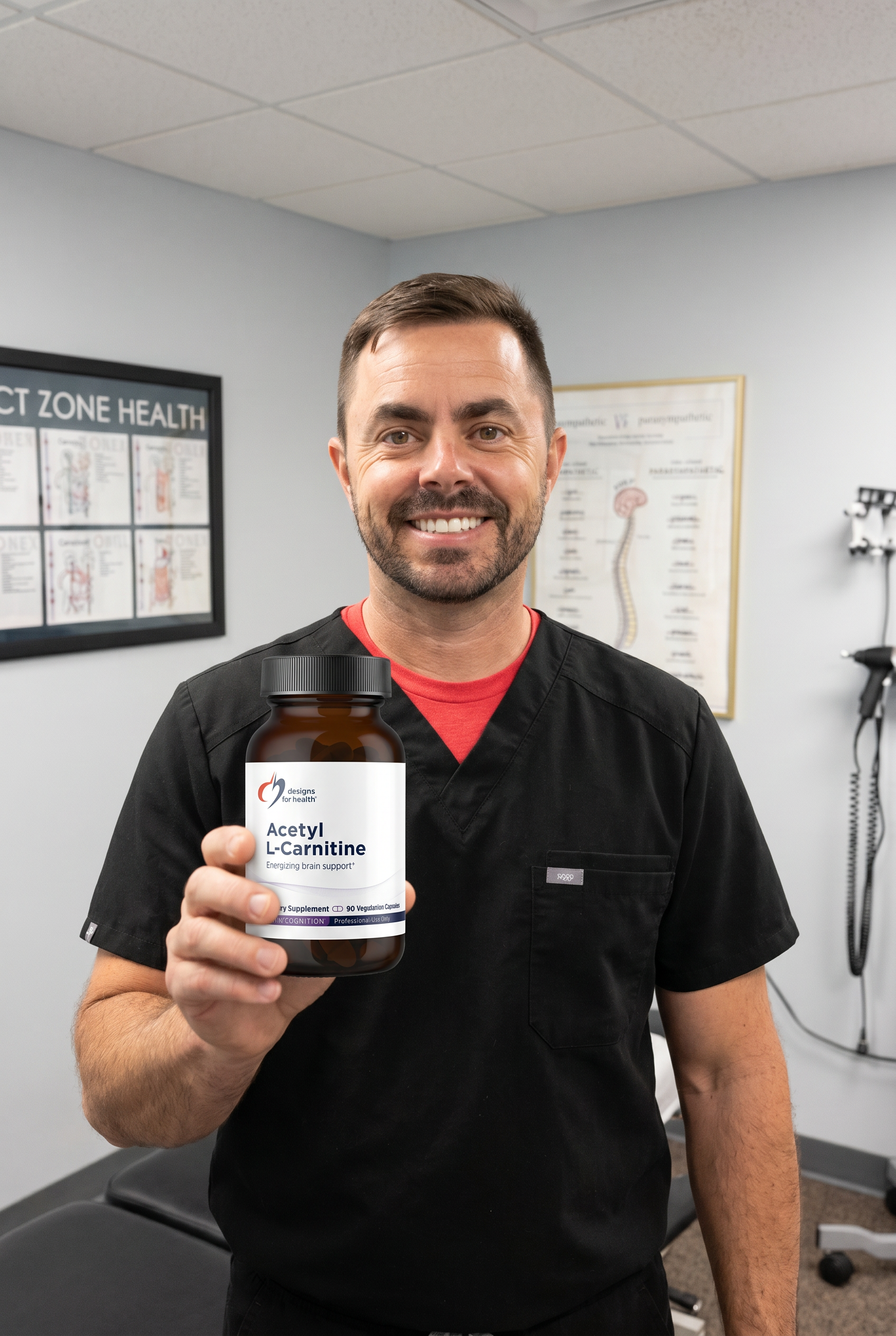 Dr. Bell holding acetyl-l-carnitine