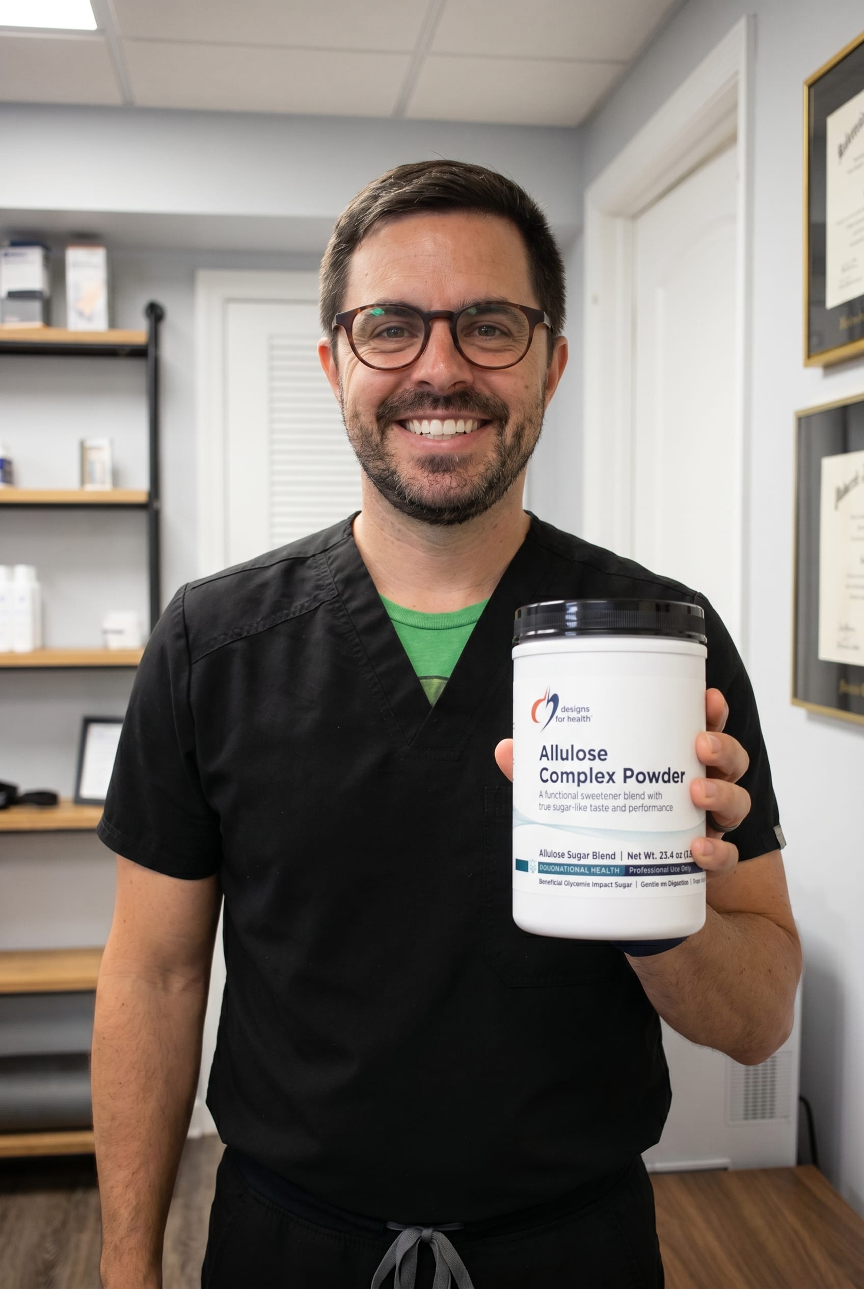 Dr. Bell holding allulose-complex-powder