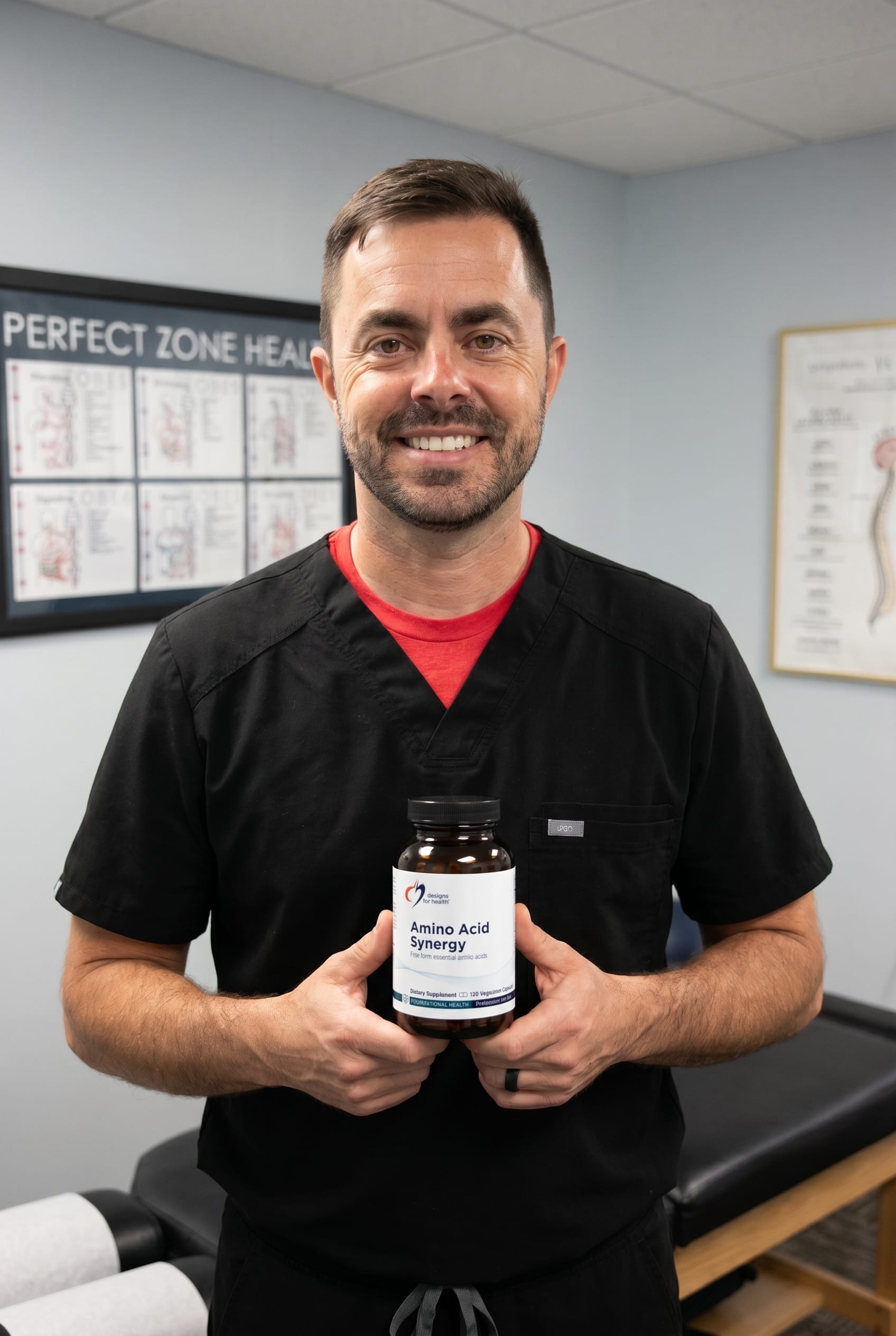 Dr. Bell holding Amino Acid Synergy