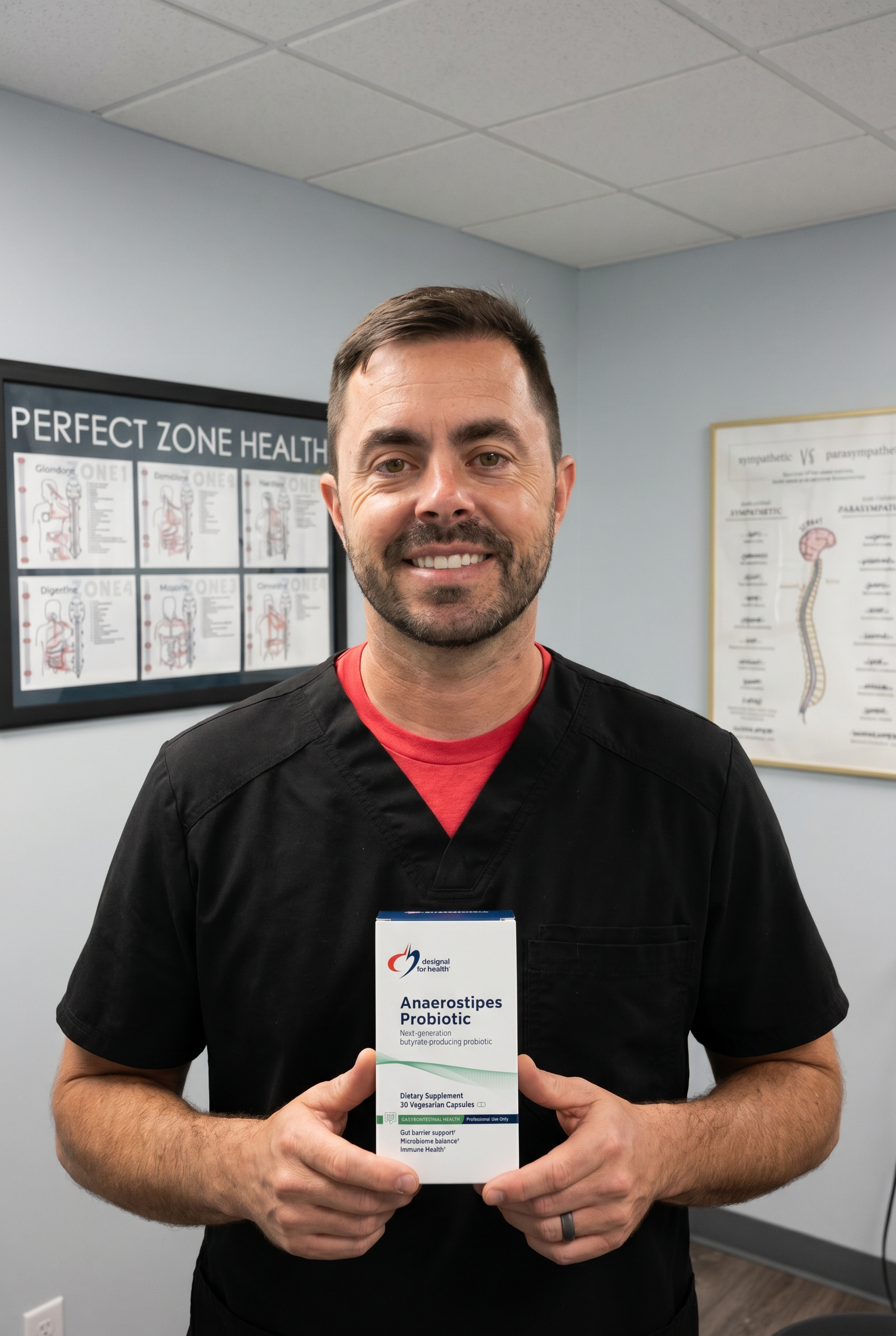 Dr. Bell holding Anaerostipes Probiotic