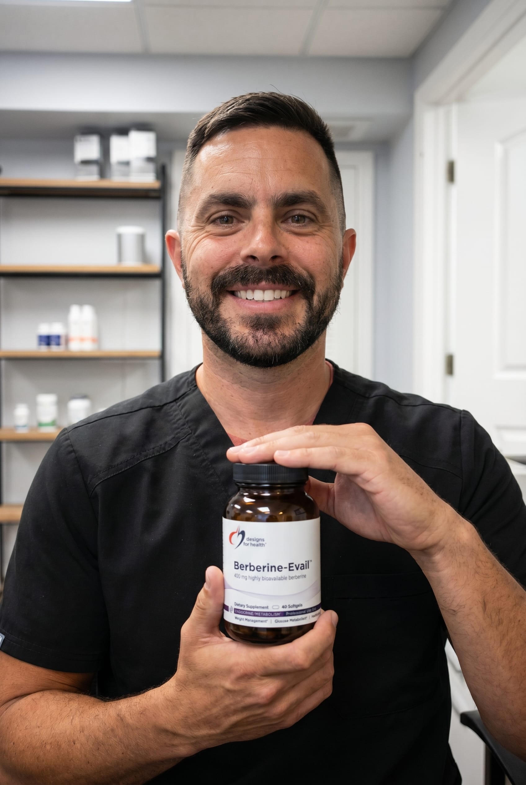 Dr. Bell holding Berberine-Evail