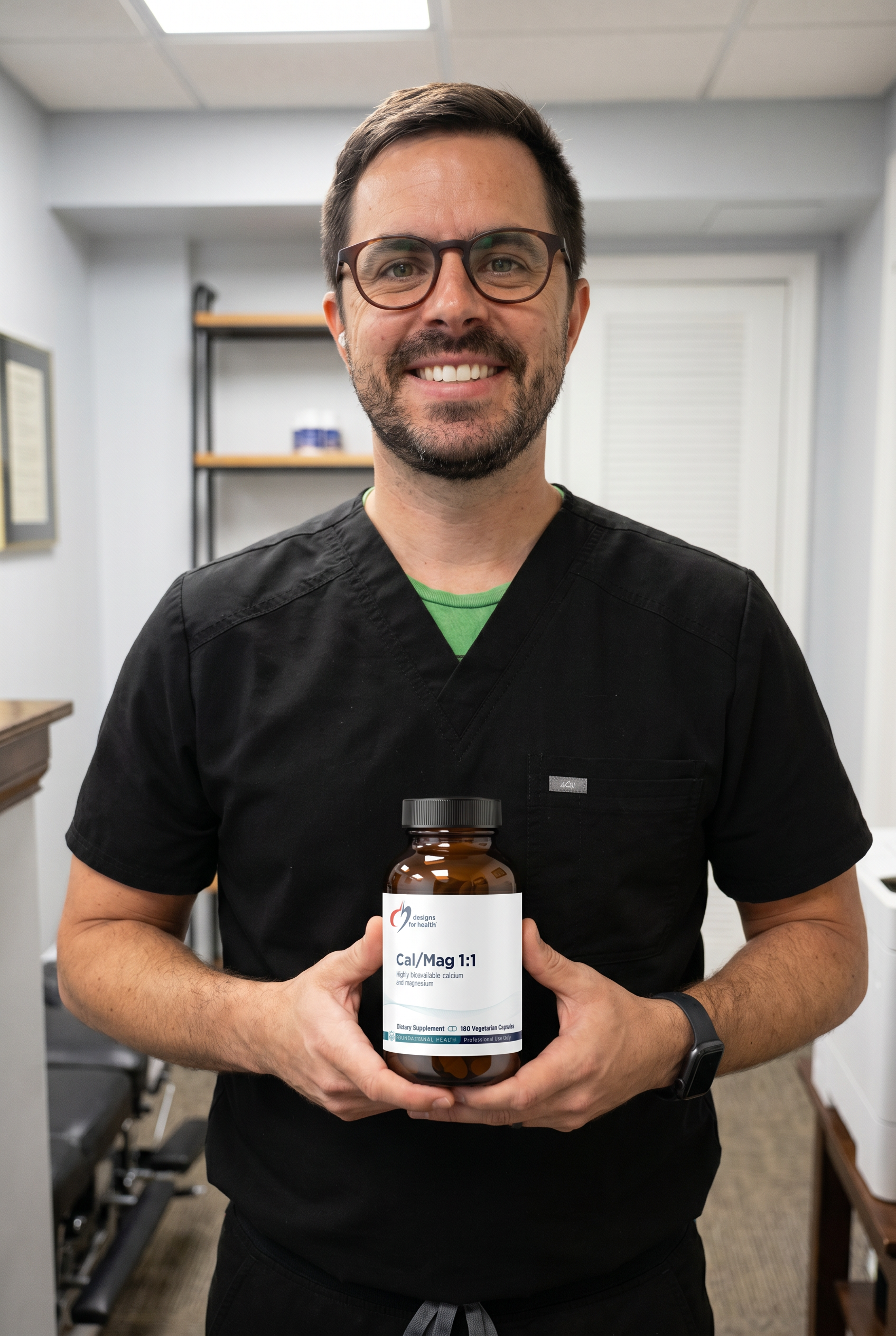 Dr. Bell holding Cal/Mag 1:1