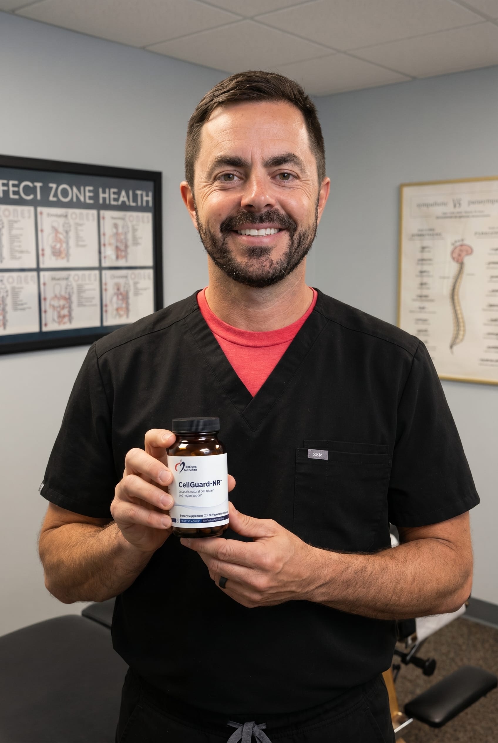 Dr. Bell holding CellGuard-NR