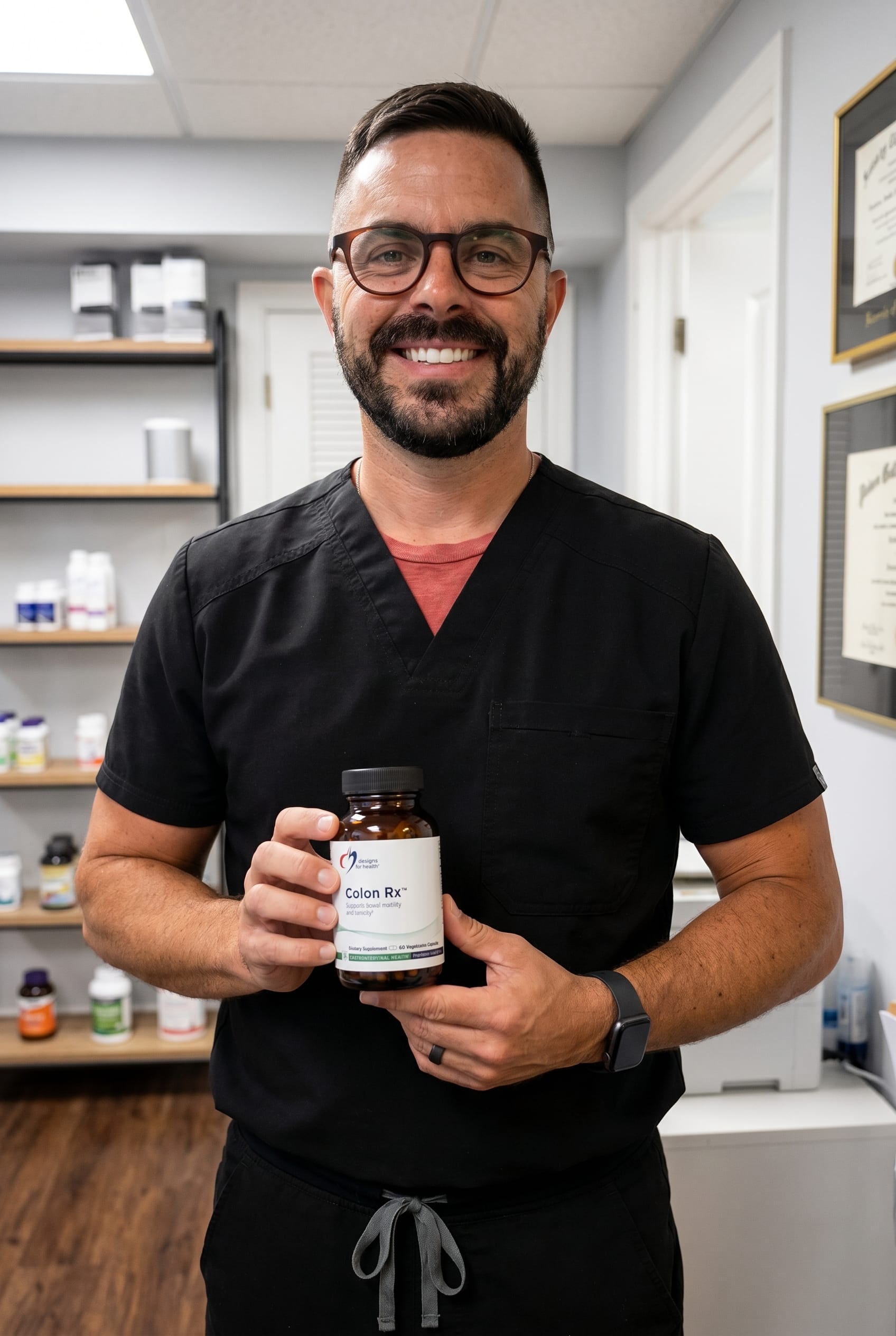 Dr. Bell holding Colon Rx