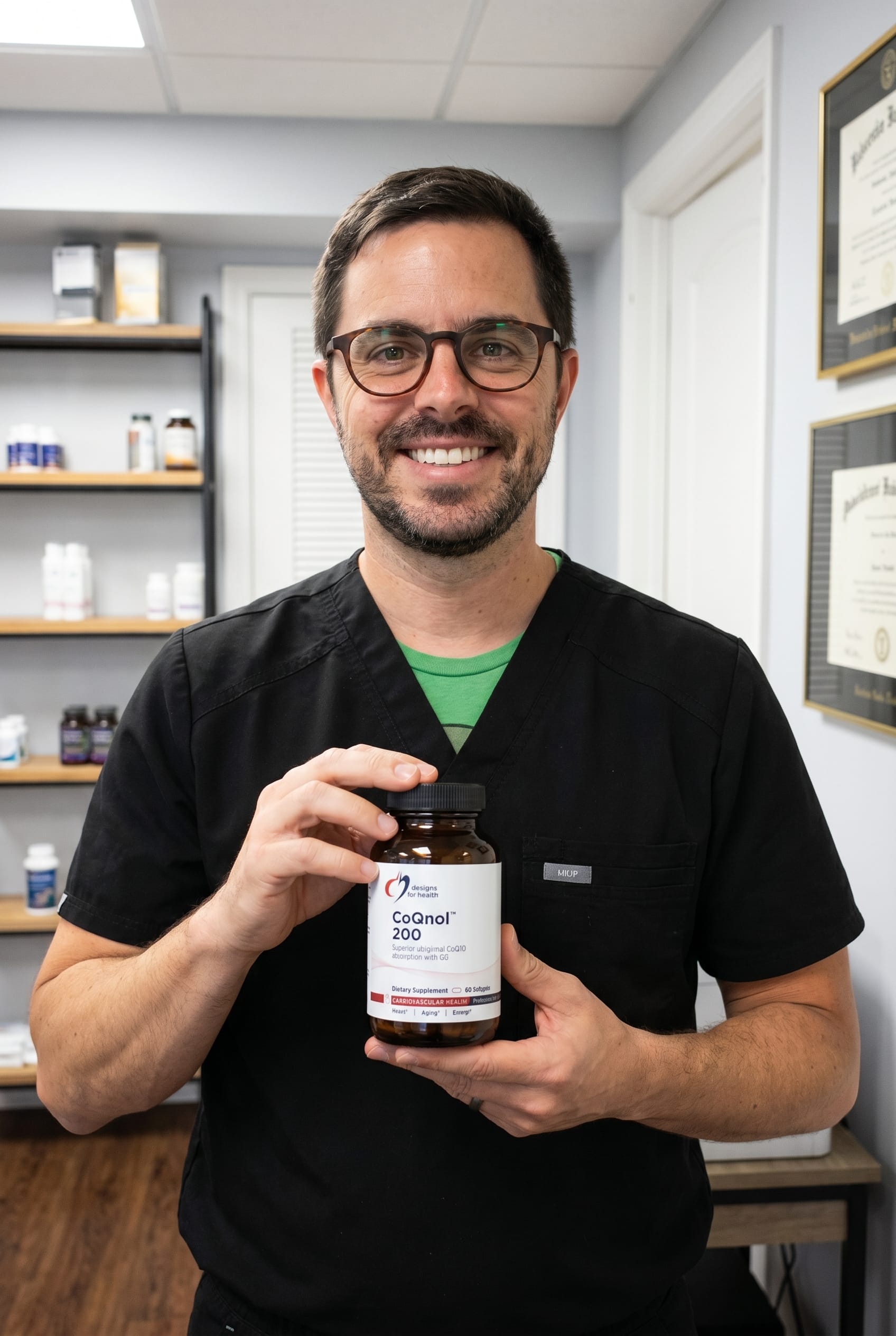Dr. Bell holding CoQnol 200