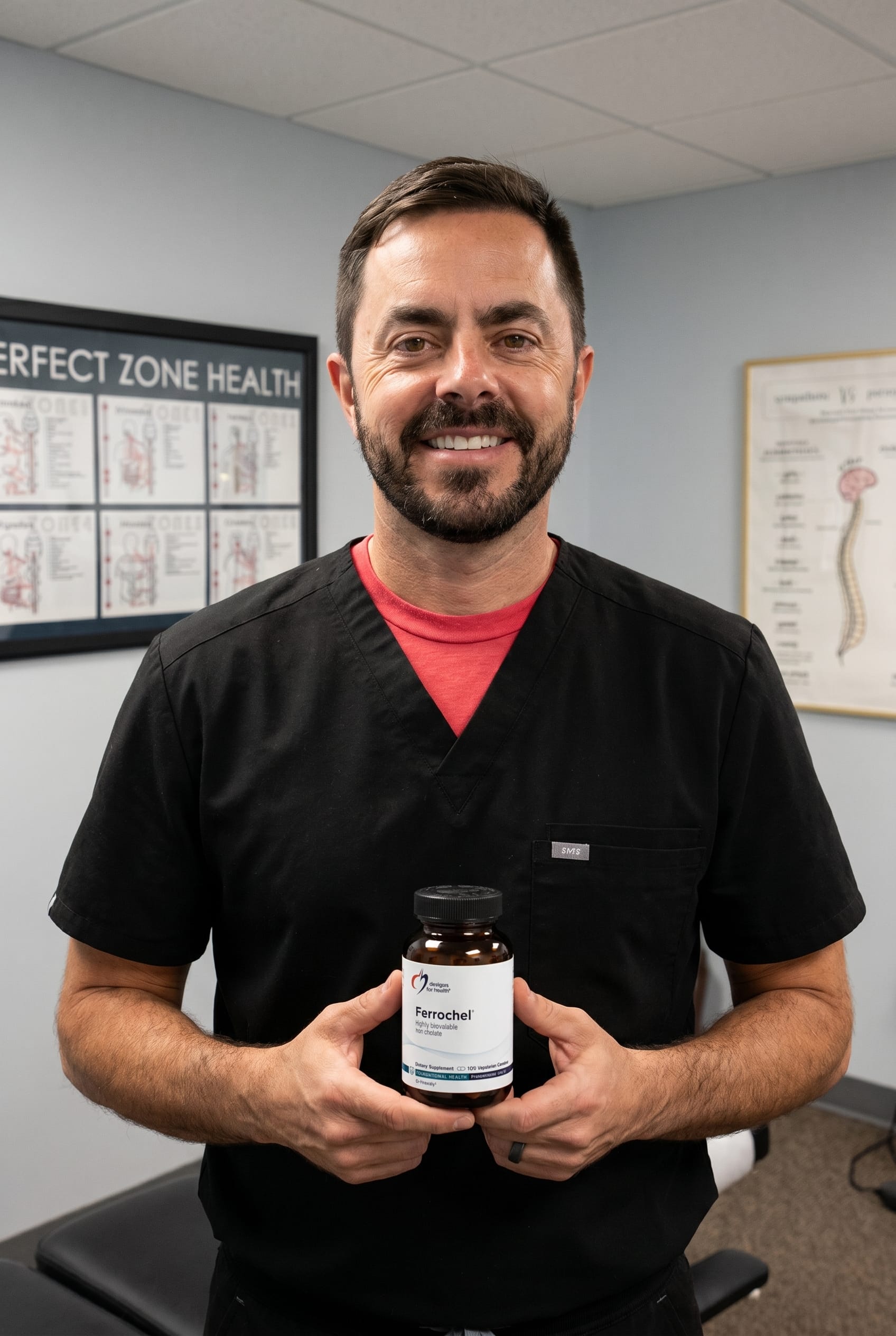 Dr. Bell holding Ferrochel Iron Chelate